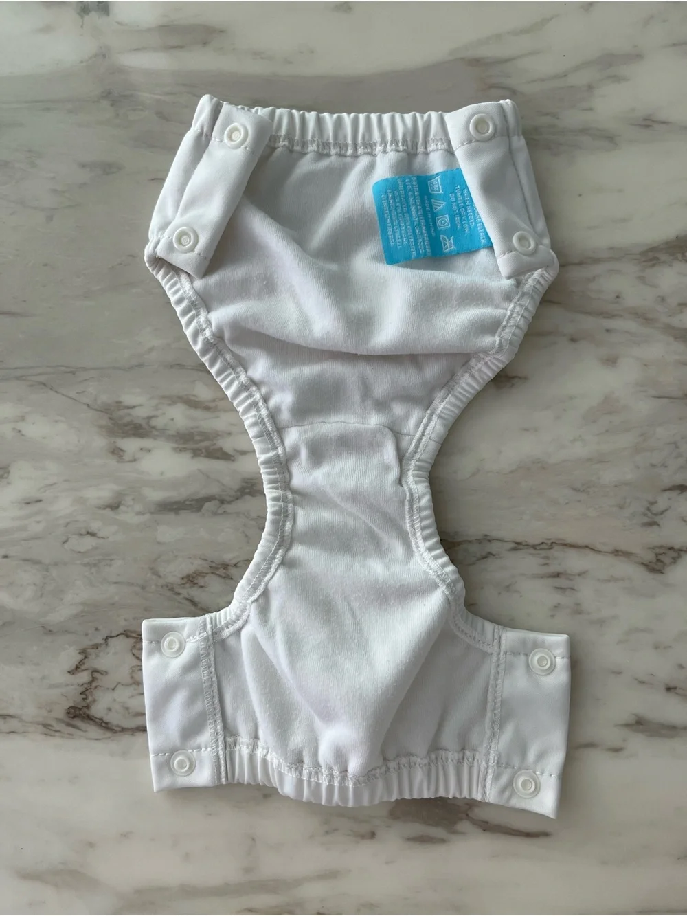 Charlie Banana White Swim Diaper Cover with Blue Logo Patch
